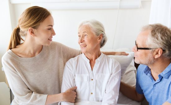 Family caring for senior woman