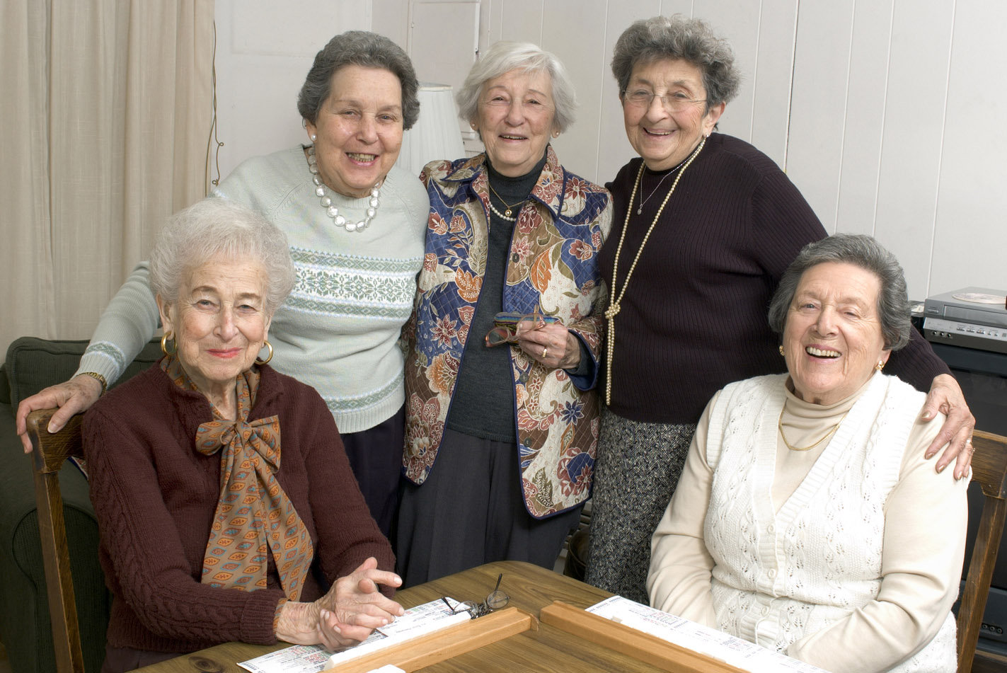 Senior Woman At The Game Table